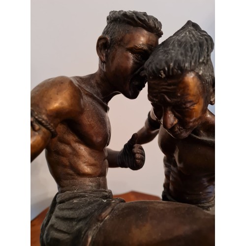 395 - Bronze figure of two MUAY THAI fighters.
H40 W39