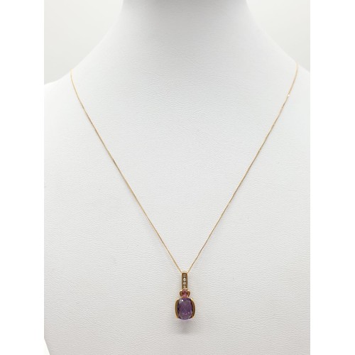 412 - 9ct gold amethyst pendant on 45cm long 9ct chain, weight 2g approx, pendant 2cm drop long