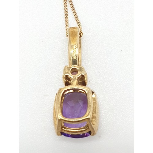 412 - 9ct gold amethyst pendant on 45cm long 9ct chain, weight 2g approx, pendant 2cm drop long