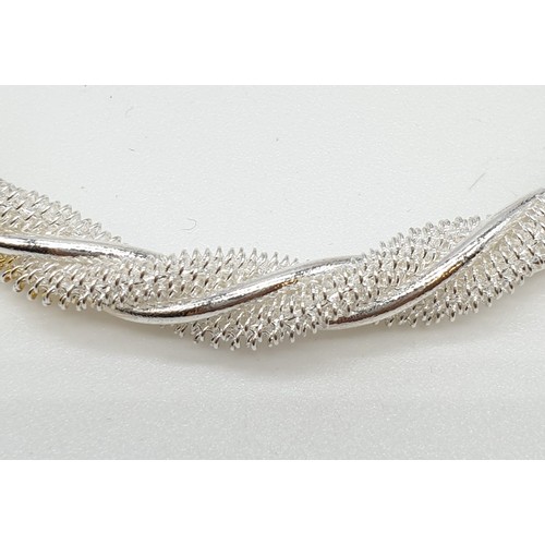 429 - Silver Twist Bangle, 15.8g.