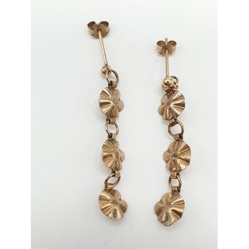 430 - Yellow metal antique pair of pearl drop earrings floral design, weight 1.84g and 4cm long approx