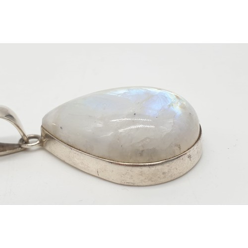 438 - Large moonstone pendant on 40cm long silver chain, weight 17.77g and stone size 35x24mm approx