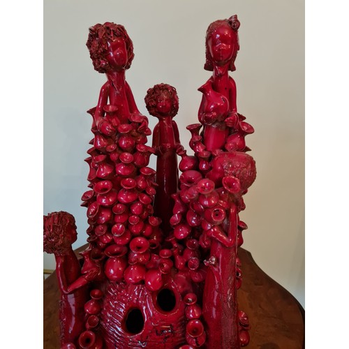 439 - Red abstract statue 
H46 W34