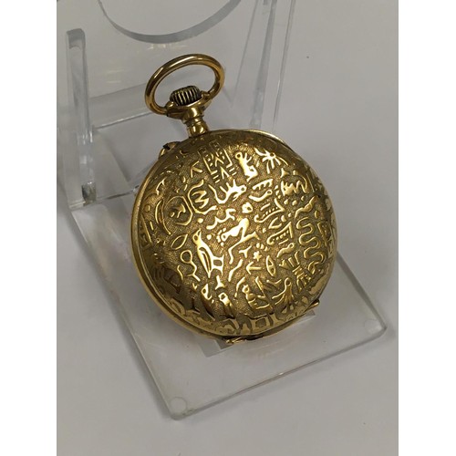 139 - Rare unusual yellow metal pocket watch with Egyptian hieroglyphs on the case , winds and ticks but n... 