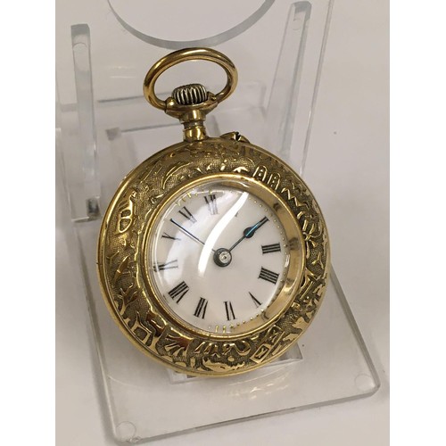 139 - Rare unusual yellow metal pocket watch with Egyptian hieroglyphs on the case , winds and ticks but n... 