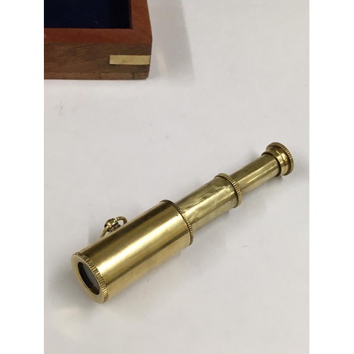 203 - Small brass mini telescope and nautical box