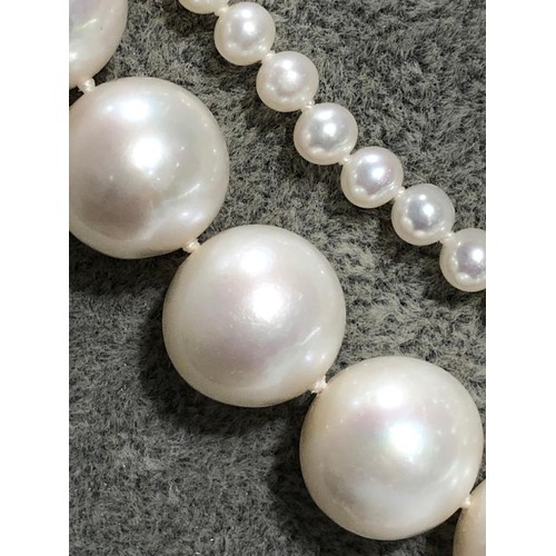 465 - Set of 2 freshwater pearl necklaces to include: one big necklace (over 19inches long) with interchan... 