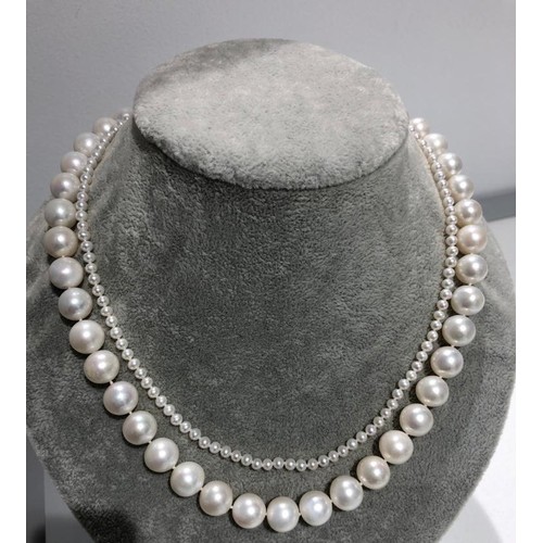 465 - Set of 2 freshwater pearl necklaces to include: one big necklace (over 19inches long) with interchan... 