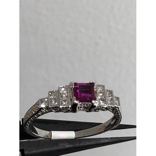 520 - 18k white gold ring with diamonds around 0.18cts and top quality ruby around 0.35cts; 2.67g; size N