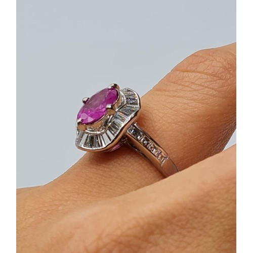 100 - Pink sapphire and diamond ring set in platinum with diamond shoulders 6.6g, size M/N