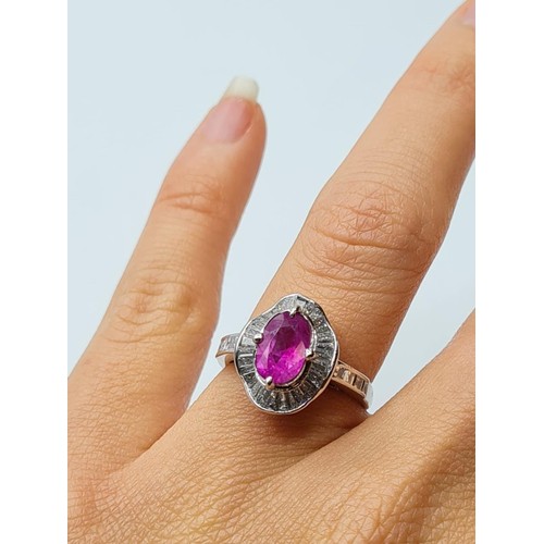 100 - Pink sapphire and diamond ring set in platinum with diamond shoulders 6.6g, size M/N