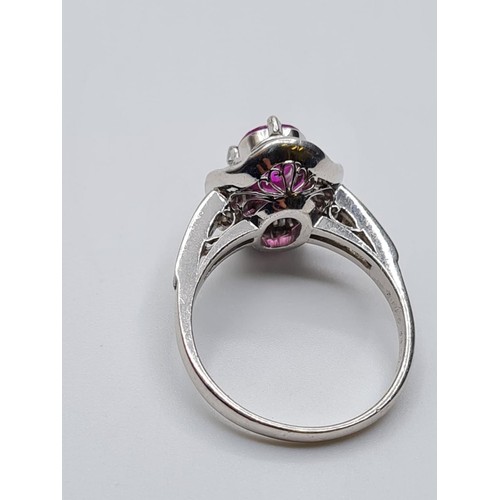 100 - Pink sapphire and diamond ring set in platinum with diamond shoulders 6.6g, size M/N