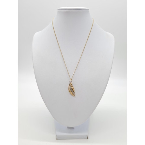 117 - 18ct gold diamond set pendant on chain, weight 3.69g and 40cm long, pendant 3 x 1cm