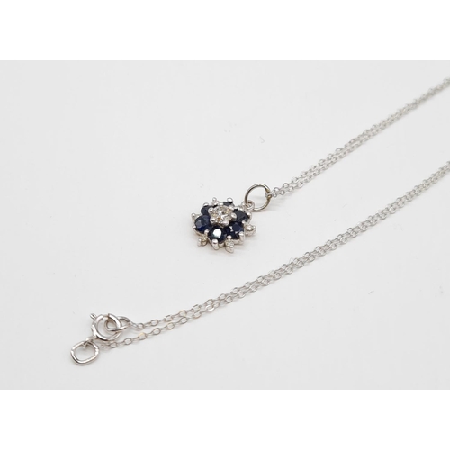 214 - 18ct gold with sapphire and diamond set pendant on 46cm long 9ct gold chain, weight 1.58g approx