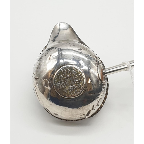 259 - George III silver Ladle with Coin set in the bottom of the bowl, dated 1787, some damage 28g 32cms