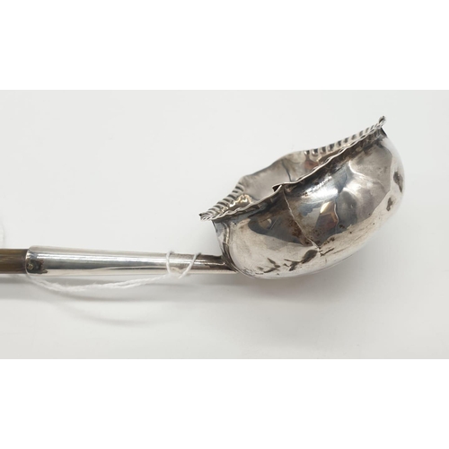 259 - George III silver Ladle with Coin set in the bottom of the bowl, dated 1787, some damage 28g 32cms