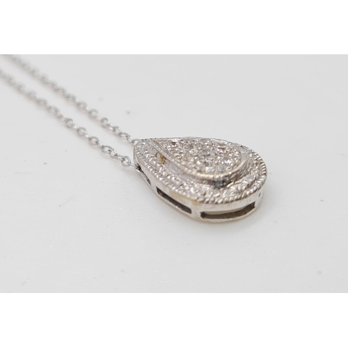 266 - 18k gold and diamond set pendant on a 40cm 9ct gold chain, weight 2g