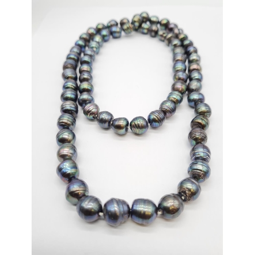 278 - A long South sea baroque pearl necklace, individually knotted pearls sizing from 9-11mm,137g weight ... 