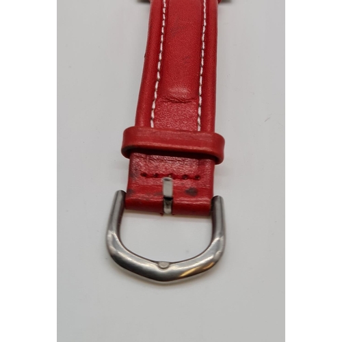 279 - Coca Cola Watch with rotating logo second counter, red leather strap