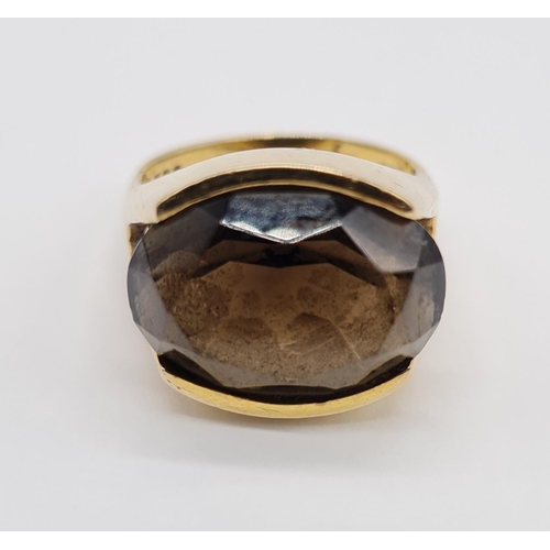 289 - 9ct Gold smokey quartz dress ring 8.3g size P