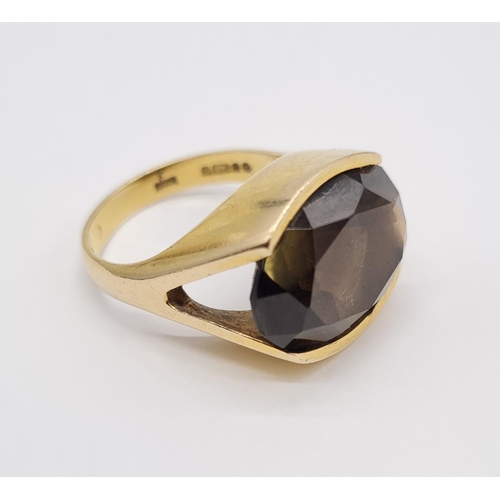 289 - 9ct Gold smokey quartz dress ring 8.3g size P