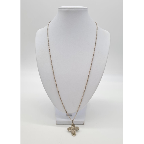 352 - Vintage silver cross set on a 62cm long silver linked chain, weight 9.79g and pendant 3cm long