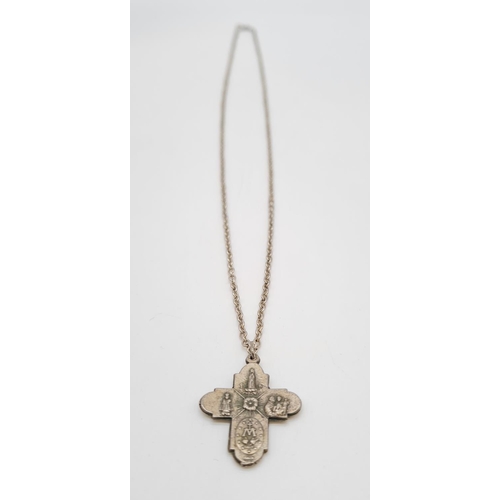 352 - Vintage silver cross set on a 62cm long silver linked chain, weight 9.79g and pendant 3cm long