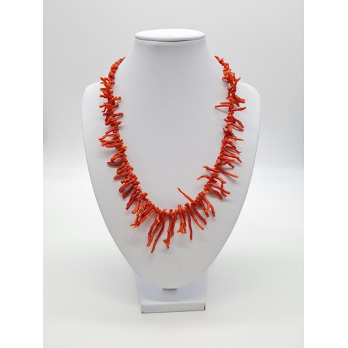 360 - Vintage coral necklace set in yellow metal clasp, weight 27.84g and 46cm long, coral drop at 3cm lon... 