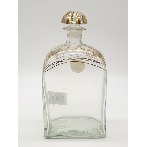 397 - Jerez of Spain Glass decanter with decorated gilt shoulder and stopper  21cms x 10cms, 80g