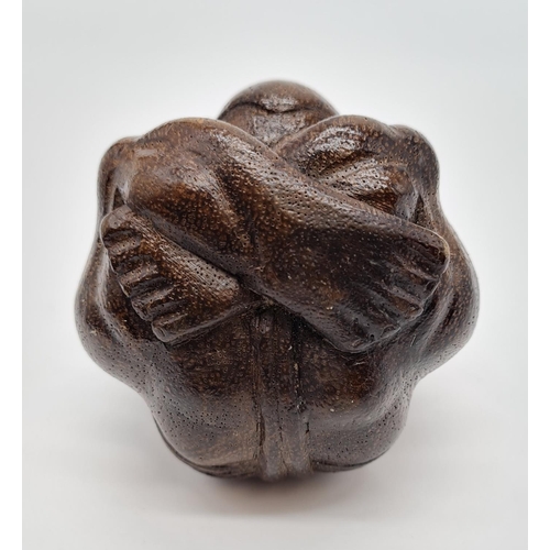 478 - Carved Wooden Effigy of a Buddhist Monk in Contemplation. 7cm diameter