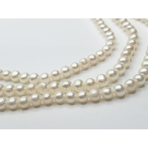 106 - 3 rows of Cultured pearl necklace set in 9ct gold clasp , weight 49g and 46cm long approx