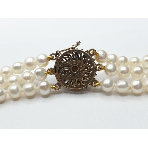 106 - 3 rows of Cultured pearl necklace set in 9ct gold clasp , weight 49g and 46cm long approx