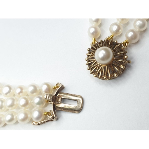 106 - 3 rows of Cultured pearl necklace set in 9ct gold clasp , weight 49g and 46cm long approx