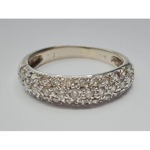 206 - 18ct white gold diamond half eternity ring, weight 2.6g and size L