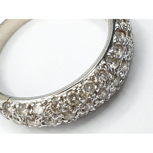 206 - 18ct white gold diamond half eternity ring, weight 2.6g and size L