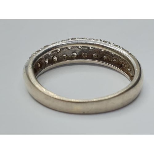 206 - 18ct white gold diamond half eternity ring, weight 2.6g and size L