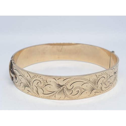 212 - Vintage rolled gold bangle, weight 24g and 6cm width approx