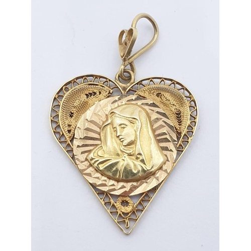 218 - 18ct yellow gold vintage heart shaped Mary pendant with filigree edged work, weight 2.43g and 2.5cm ... 