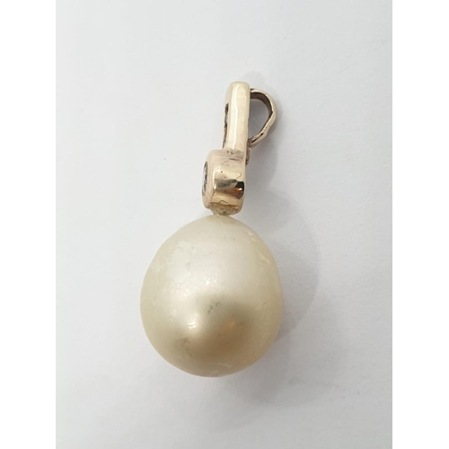 256 - Large pearl pendant set in diamond and 9ct gold, weight 3.21g and pearl size 15mm approx