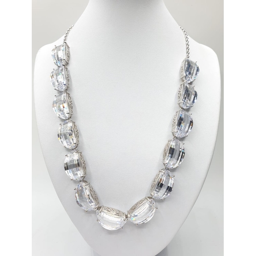 274 - Large crystal silver (rhodium treated) necklace with expandable chain, maximum length 52cm approx, c... 