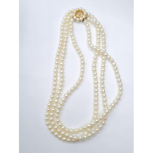 290 - 3 rows of cultured pearls choker necklace set in 9ct gold clasp, weight 45g and 33cm long approx