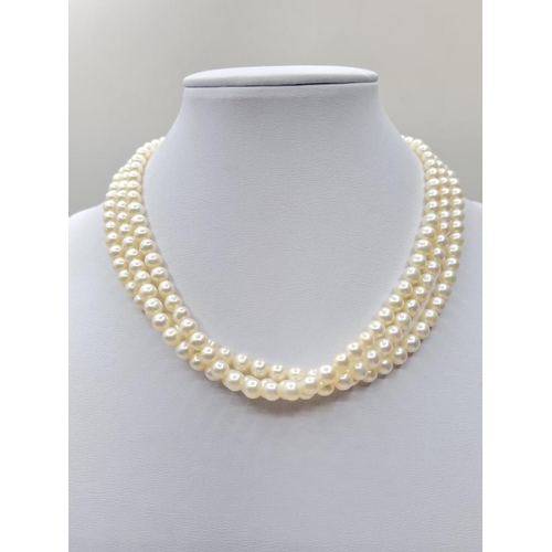 290 - 3 rows of cultured pearls choker necklace set in 9ct gold clasp, weight 45g and 33cm long approx