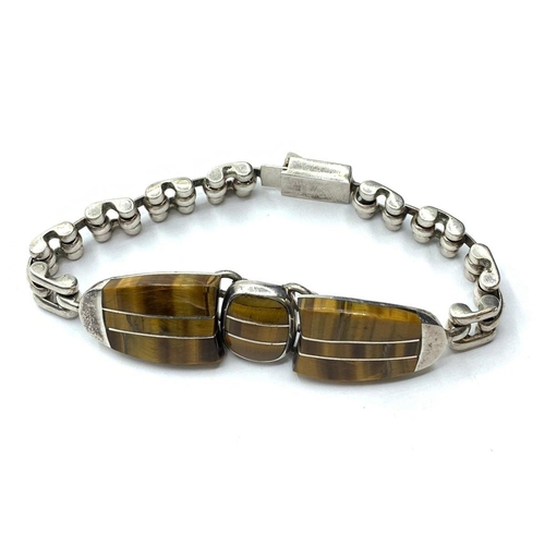 608 - SILVER TIGERS EYE SET BRACELET, WEIGHT 44.5G