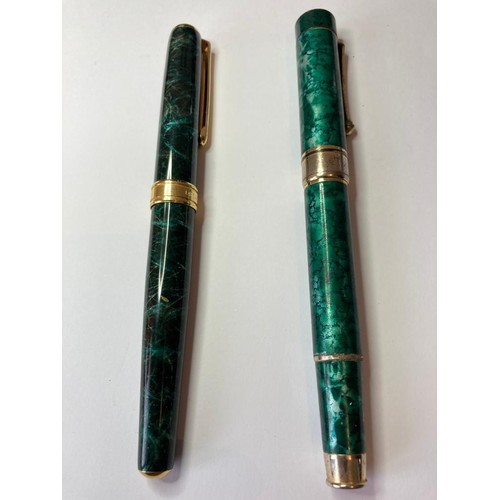 597 - 2x vintage fountain pens to include
1x diplomat having dark green marble finish and cartridge fillin... 