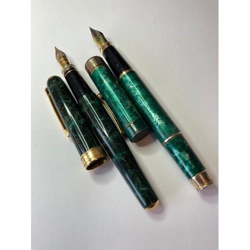 597 - 2x vintage fountain pens to include
1x diplomat having dark green marble finish and cartridge fillin... 