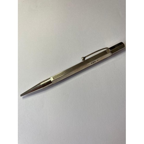 311 - Vintage silver propelling pencil, hexagonal form with engine turned design to three sides, clear hal... 