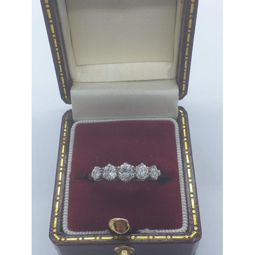 102 - Vintage 18ct gold ring set with 5 diamond stones, weight 2.44g and size L1/2