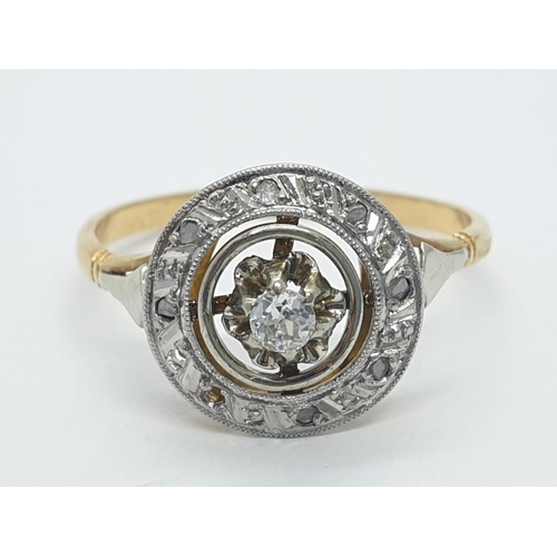 202 - An antique Art Deco diamond halo ring set in yellow metal shank (1 stone missing), weight 2g and siz... 