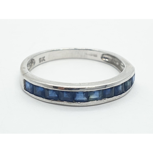 210 - 9ct white gold half eternity sapphire ring, weight 1.63g and size N