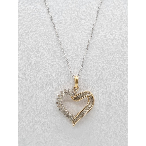 232 - 9ct gold diamond heart pendant on 46cm long 9ct gold chain, weight 2.2g and pendant 17mm long approx